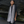 Load image into Gallery viewer, women standing in front of a black rock wearing a black and white tie dye linen scarf with leather tassels