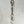 Load image into Gallery viewer, art nouveau crystal pendant necklace. spire connector with crystal pendant with chain and adjustable clasp.