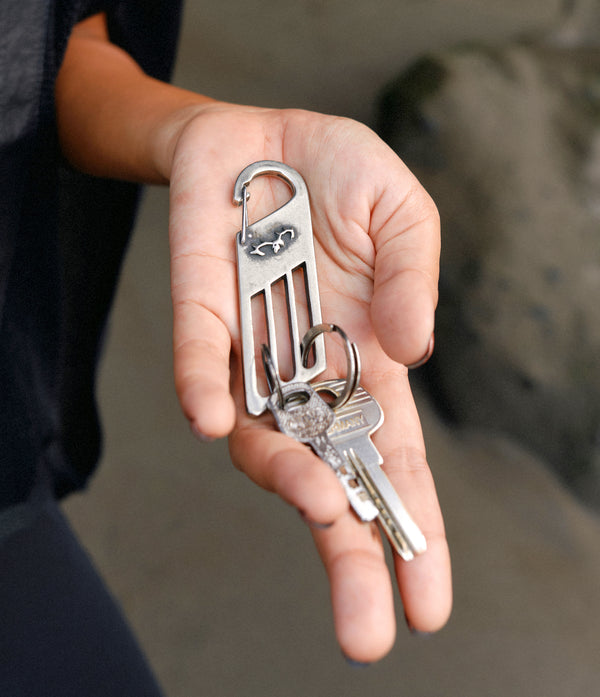 hand holding jan hilmer metal key clip