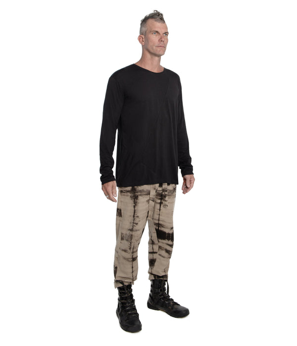 Relax fit long sleeve men's shirt crafted from light weight bamboo-cotton blend.  With 2 asymmetrical seam lines on its front, and 1 vertical seam running down its back this men's shirt is simple yet unique and original.