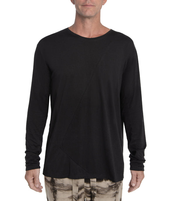 Relax fit long sleeve men's shirt crafted from light weight bamboo-cotton blend.  With 2 asymmetrical seam lines on its front, and 1 vertical seam running down its back this men's shirt is simple yet unique and original.