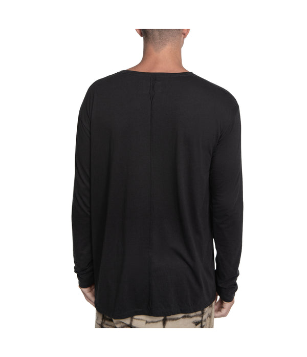 Relax fit long sleeve men's shirt crafted from light weight bamboo-cotton blend.  With 2 asymmetrical seam lines on its front, and 1 vertical seam running down its back this men's shirt is simple yet unique and original.