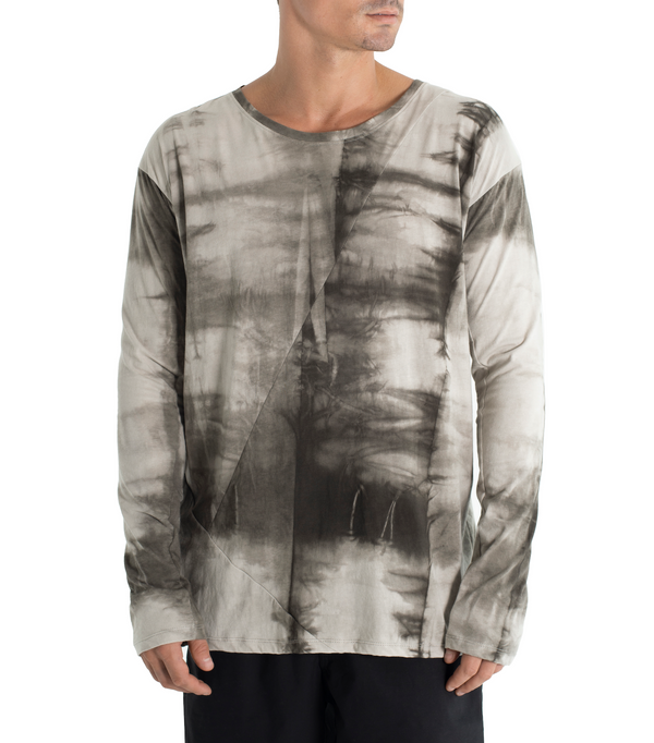 Relax fit long sleeve shirt crafted from light weight certified organic cotton.  With 2 asymmetrical seam lines on its front, and 1 vertical seam running down its back this shirt is simple yet unique and original. Hand dyed with plants.