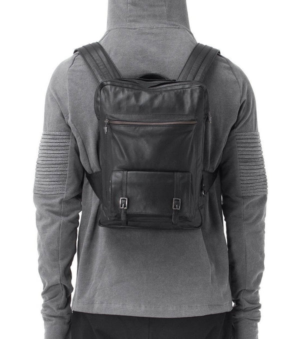 The ultimate computer case. Slim, light, and durable, this is the perfect laptop bag that doesn't look like a laptop backpack. Designed to fit Macbook airs and other small computers and tablets, this is great travel electronics bag that is simultaneously fashionable and secure.
