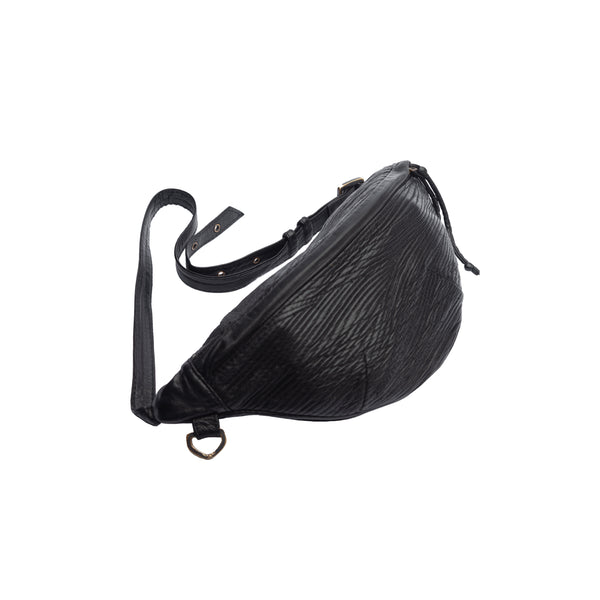 Leather fanny pack. Compact, adjustable leather waist bag designed to carry a wallet, an iphone, a few miscellaneous items and some keys.