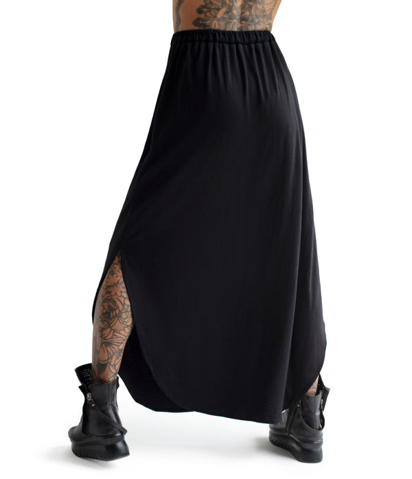 long skirt. Made of ultra soft bamboo & GOTS certified organic cotton blend.  Approx 39" from waist to ground. Made in Small Batches.  Elastic waist band with tie strings finished with custom metal caps.