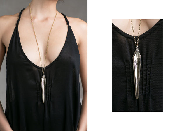 Hand cast geometrical pendant with matching chain.