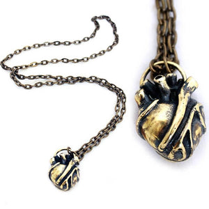 anatomical heart pendant. large brass heart. heart necklace.