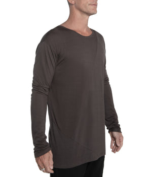 Relax fit long sleeve men's shirt crafted from light weight bamboo-cotton blend. With 2 asymmetrical seam lines on its front, and 1 vertical seam running down its back this men's shirt is simple yet unique and original.