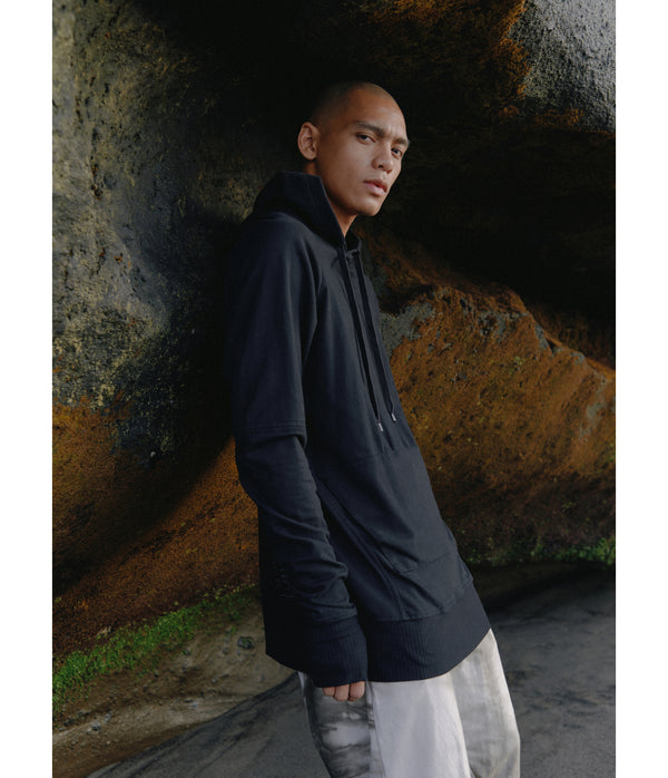Drawstring hoodie sweatshirt crafted from medium weight cotton terry finished with ecovero* ribbing, lined hood.