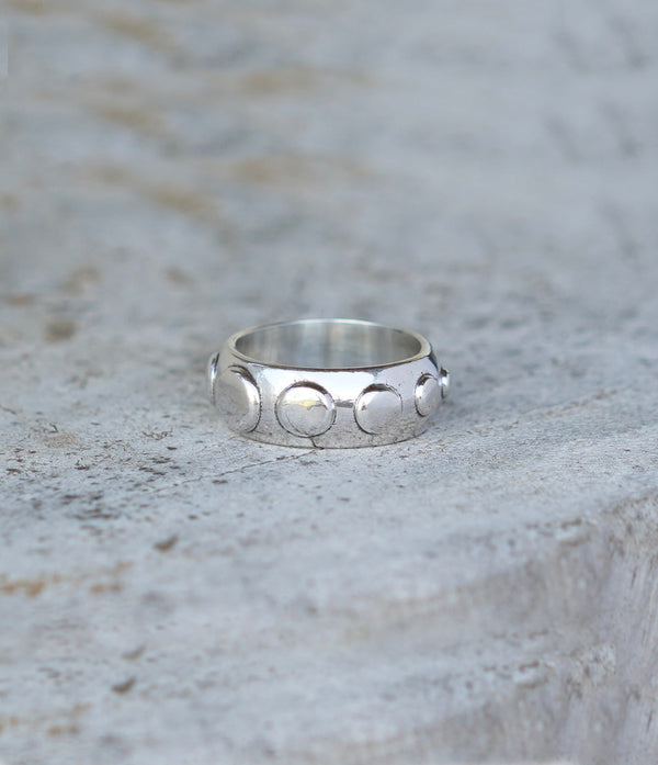 Handmade silver ring band with circle pattern.  Can be worn by a man or a woman, unisex and minimalist.